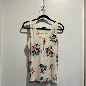 Floral white sleeveless blouse
